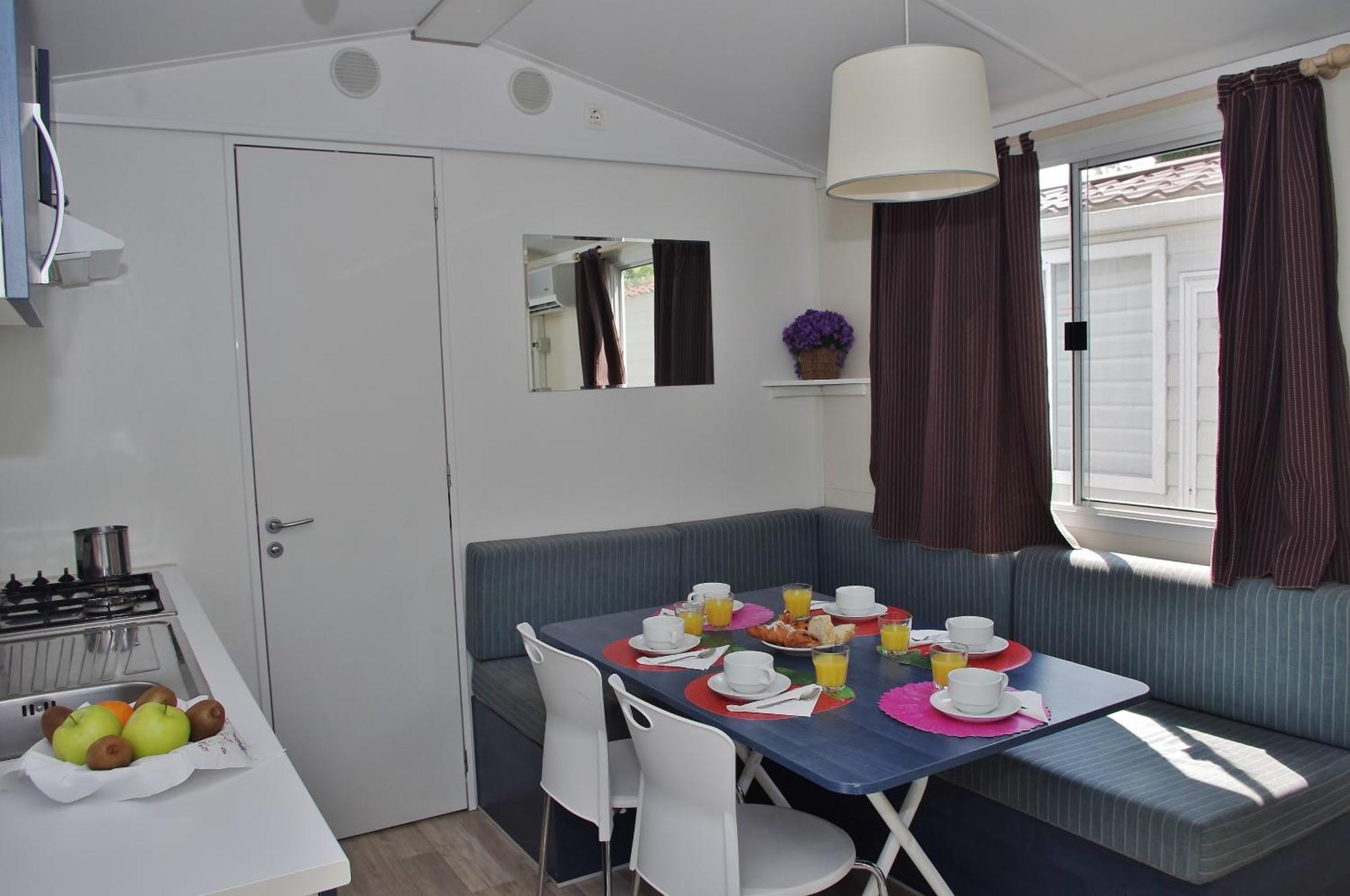 Happy Camp Mobile Homes In Camping Village Baia Paradiso บาเดซี ภายนอก รูปภาพ
