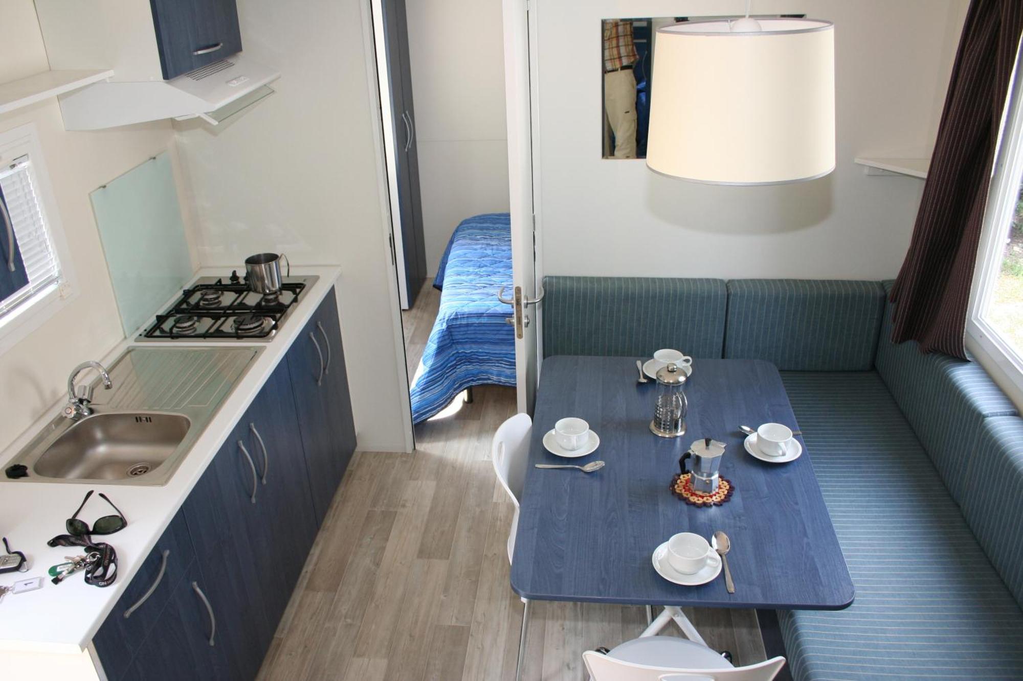 Happy Camp Mobile Homes In Camping Village Baia Paradiso บาเดซี ภายนอก รูปภาพ